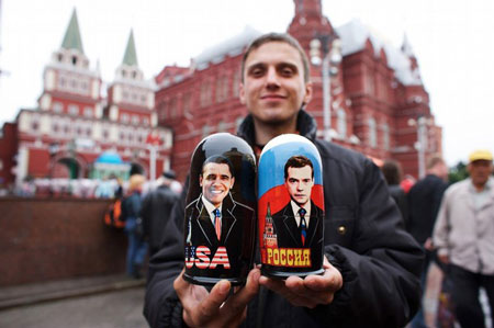 A souvenir seller displays matryoshka dolls, or Russian nesting dolls, painted with portraits of U.S. President Barack Obama and Russian president Dmitry Medvedev near Red Square on July 5, 2009 in Moscow, Russia.